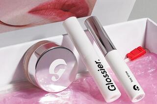 make-up products with pink make-up bag
